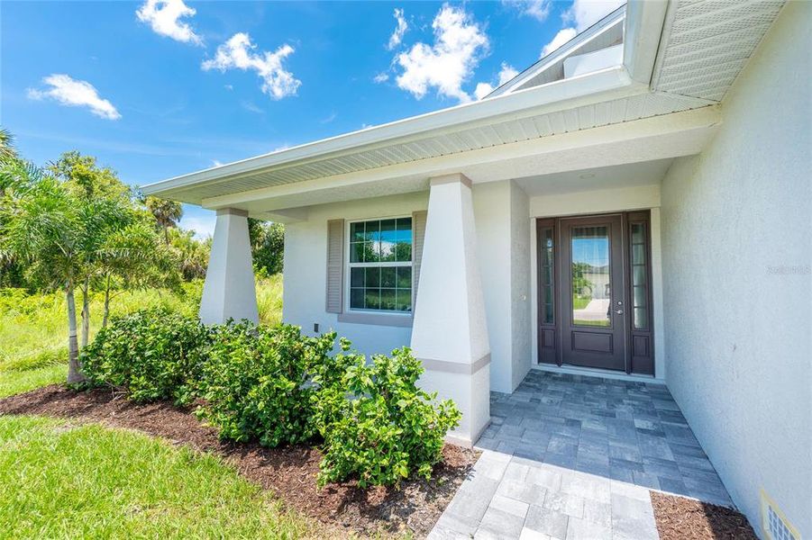 Front exterior of a new home in , Rotonda West, FL, highlighting curb appeal (Image 28). Front exterior of a new home in , Rotonda West, FL, highlighting curb appeal (Image 28).