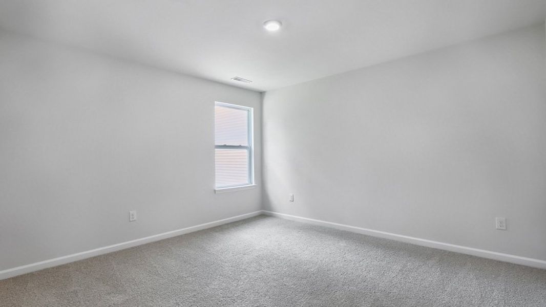 Spacious, unfurnished interior of a new home in The Estates at Edinborough, Gibsonville (Image 31).