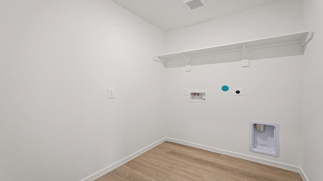 Spacious, unfurnished interior of a new home in Sunterra, Katy (Image 21).