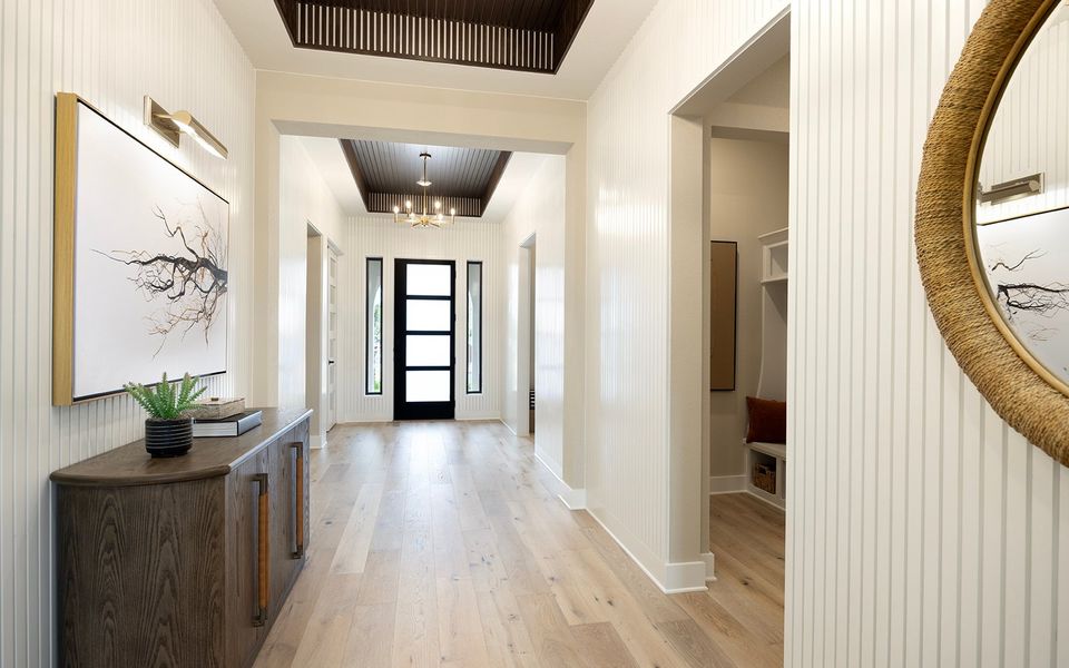 Representative furnished interior of a home built from the Champlain by Brookfield Residential in Kissing Tree, San Marcos (Image 11).