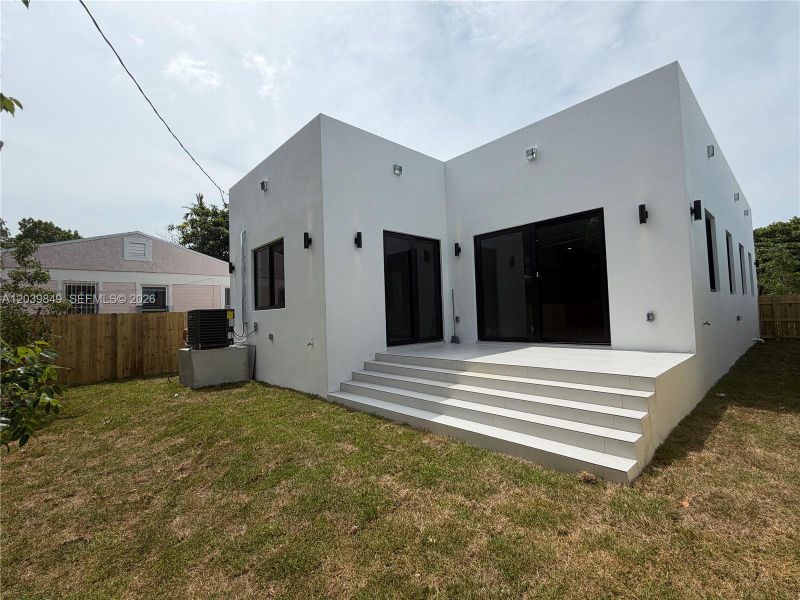 Exterior details and patio area of a home in , Miami (Image 24). Exterior details and patio area of a home in , Miami (Image 24).