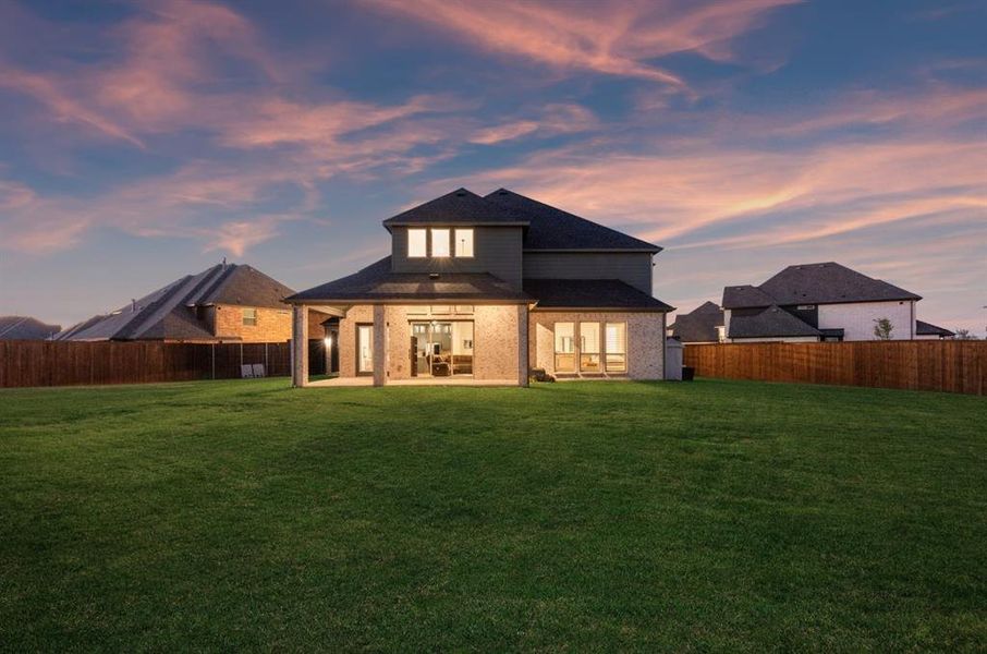 Exterior details and patio area of a home in Cambridge Estates, Prosper (Image 3). Exterior details and patio area of a home in Cambridge Estates, Prosper (Image 3).