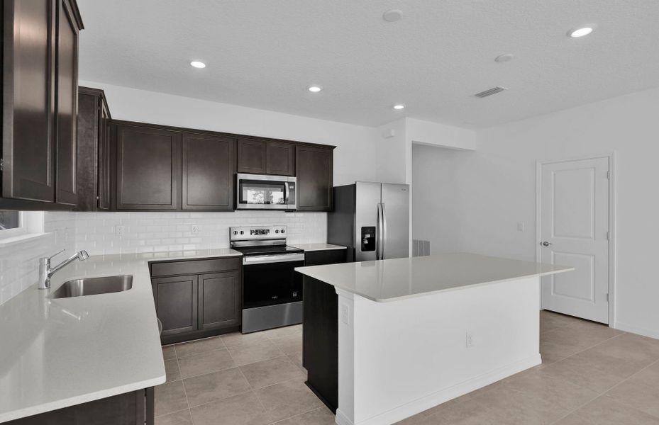 Furnished interior view inside a new home in Hyland Trail, Green Cove Springs (Image 11).
