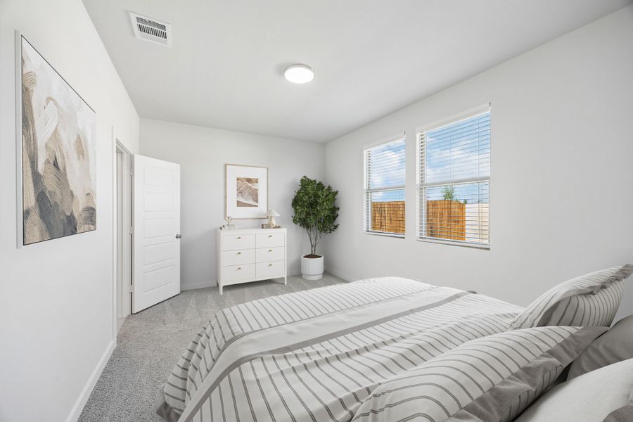Primary Bedroom in the Birch home plan by Trophy Signature Homes – REPRESENTATIVE PHOTO
