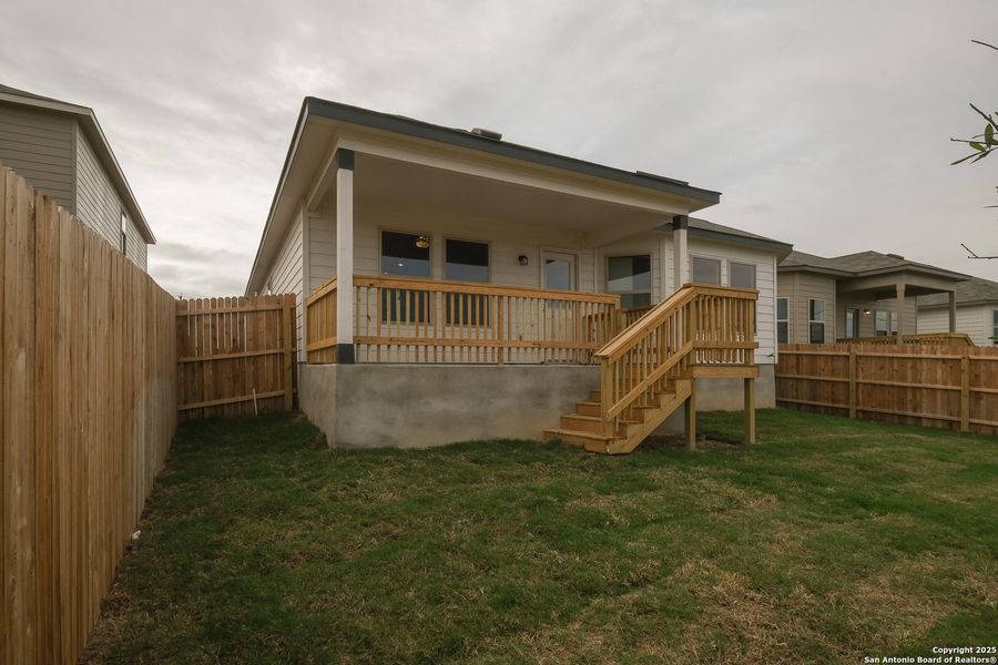 Front exterior of a new home in Agave, San Antonio, TX, highlighting curb appeal (Image 14).