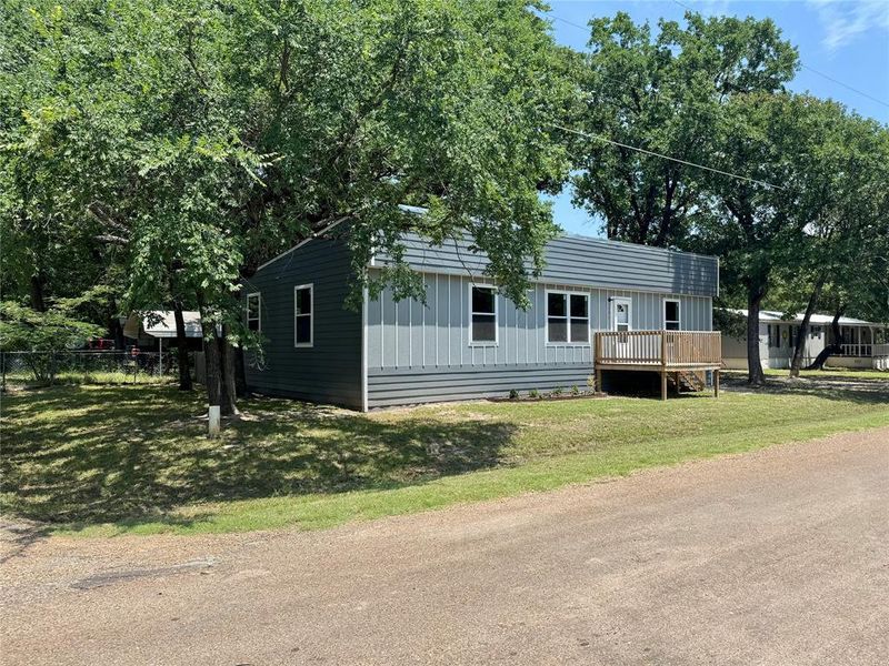 Front exterior of a new home in , Mabank, TX, highlighting curb appeal (Image 1). Front exterior of a new home in , Mabank, TX, highlighting curb appeal (Image 1).