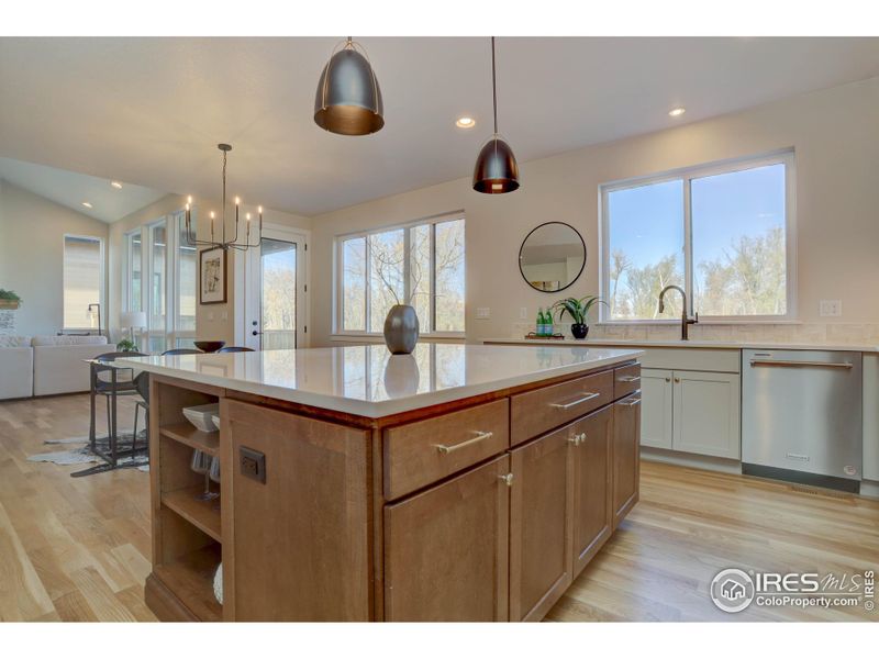 Custom kitchen lighting and gleaming countertops