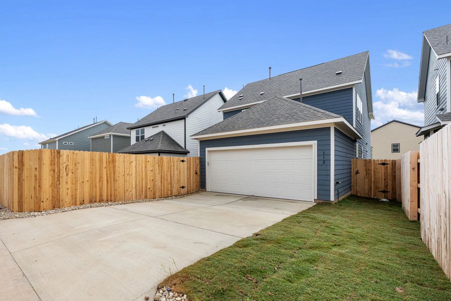 Exterior details and patio area of a home in The Cottages at Lariat, Liberty Hill (Image 30).