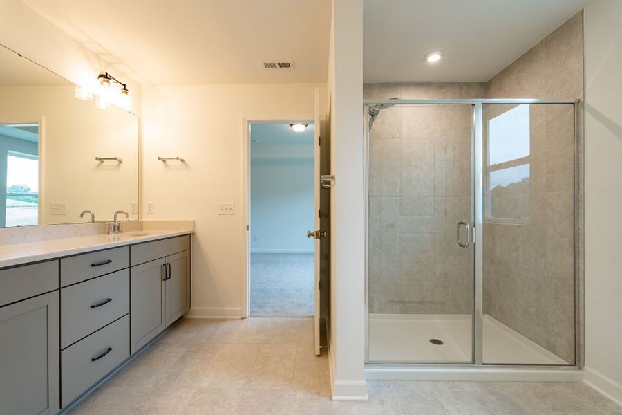 Representative furnished interior of a home built from the The Wellshire by David Weekley Homes in Serenity - The Cottage Collection, Fuquay Varina (Image 6).