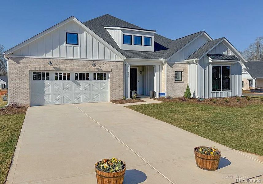 Front exterior of a new home in , Grand Junction, CO, highlighting curb appeal (Image 22).