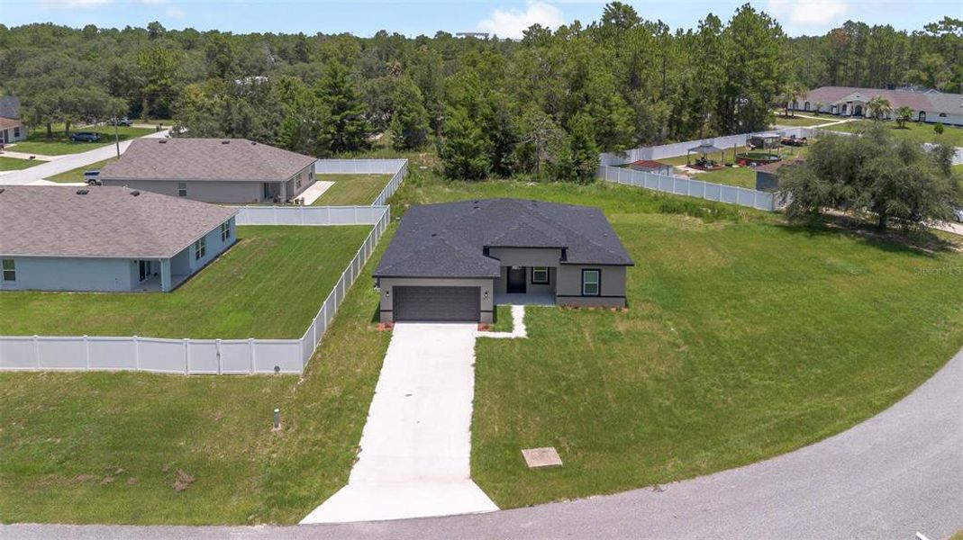 Front exterior of a new home in , Ocala, FL, highlighting curb appeal (Image 2). Front exterior of a new home in , Ocala, FL, highlighting curb appeal (Image 2).