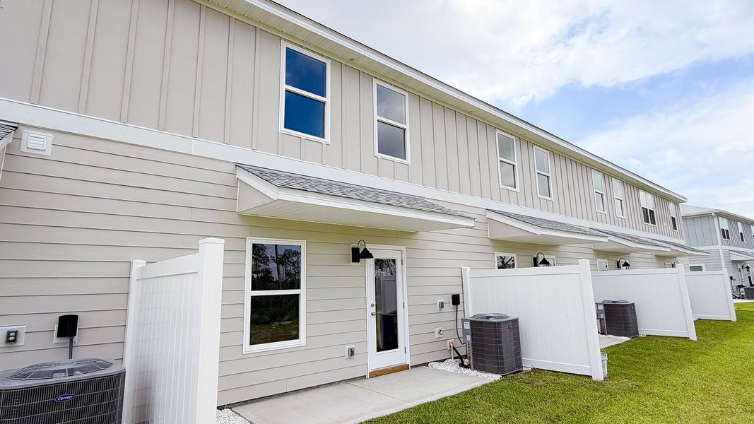 Exterior details and patio area of a home in WindMark Beach, Port Saint Joe (Image 20).