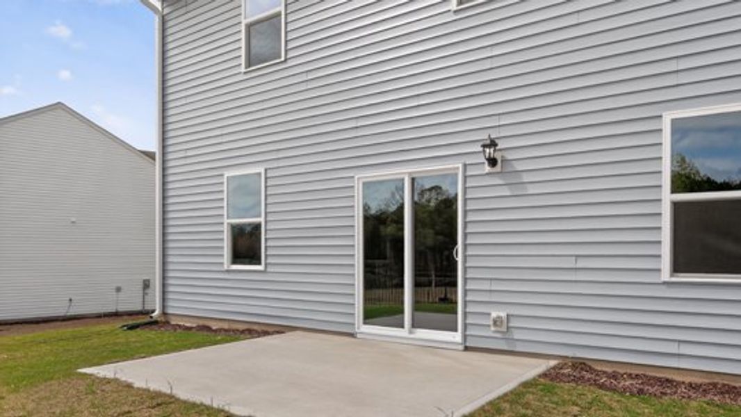 Exterior details and patio area of a home in Shahbain Reserve, Raeford (Image 3).
