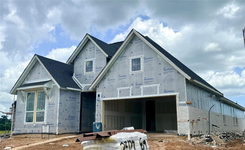 In-progress construction of a new home in Pecan Ridge, Fulshear, TX (Image 8).