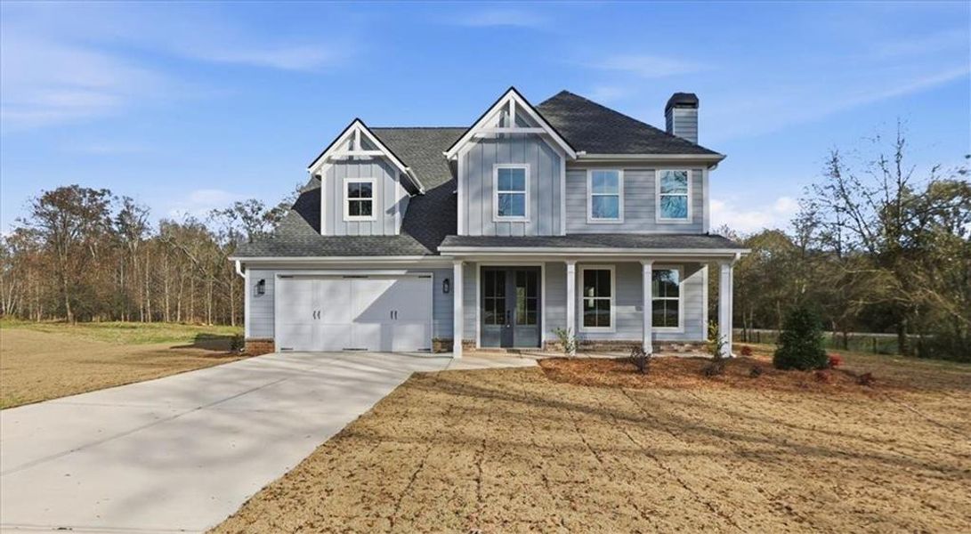 Front exterior of a new home in , Statham, GA, highlighting curb appeal (Image 30). Front exterior of a new home in , Statham, GA, highlighting curb appeal (Image 30).