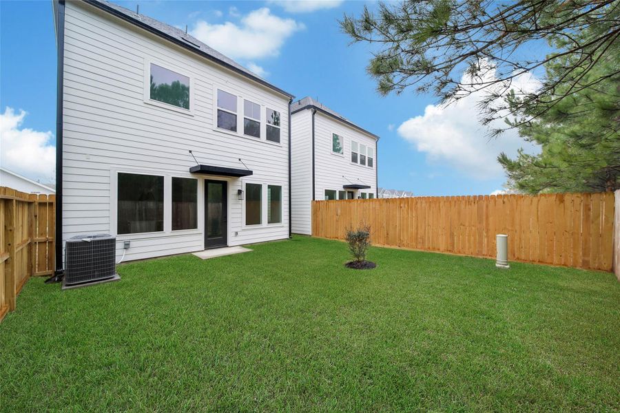 Exterior details and patio area of a home in , Houston (Image 3).