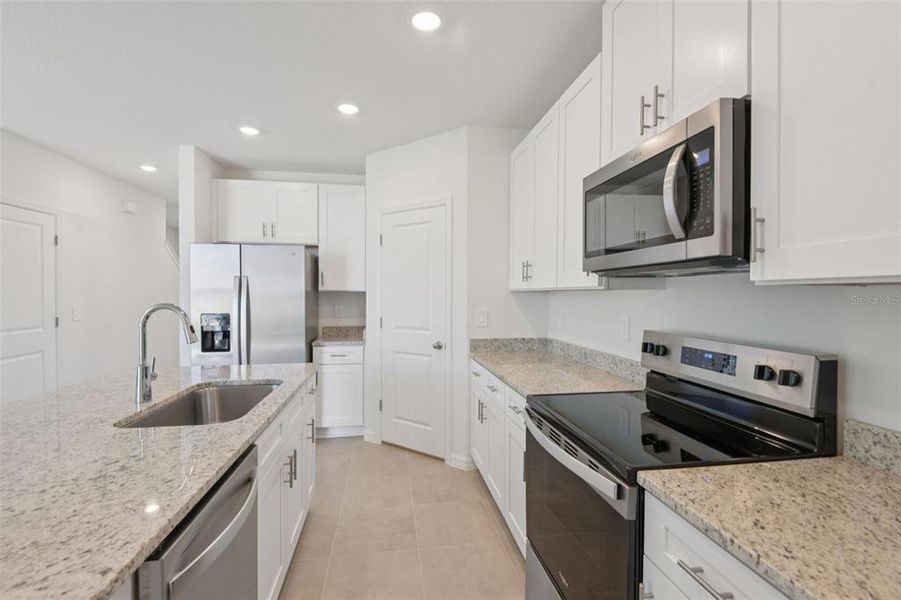 Furnished interior view inside a new home in Hilltop Vistas, Dade City (Image 6).