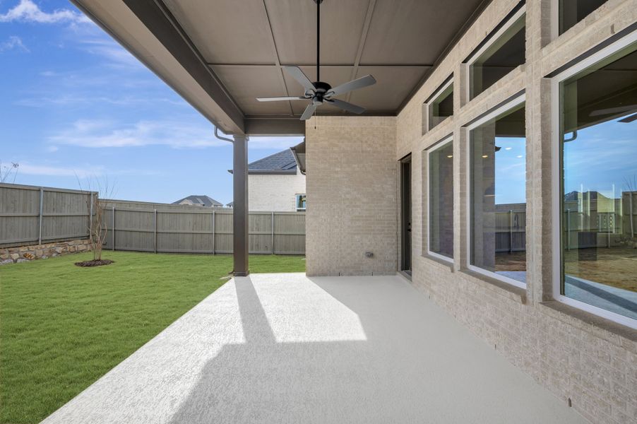 Exterior details and patio area of a home in Pecan Square – Classics, Northlake (Image 4). Exterior details and patio area of a home in Pecan Square – Classics, Northlake (Image 4).