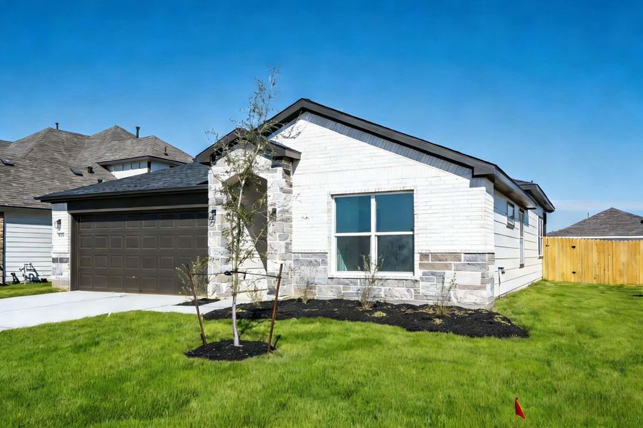 Front exterior of a new home in , Cleveland, TX, highlighting curb appeal (Image 15).