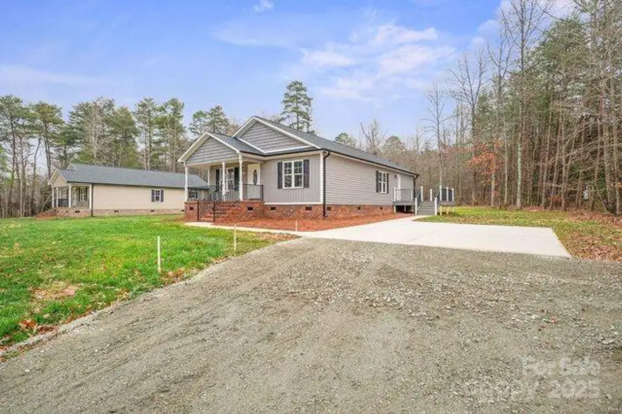 Front exterior of a new home in , Salisbury, NC, highlighting curb appeal (Image 1). Front exterior of a new home in , Salisbury, NC, highlighting curb appeal (Image 1).