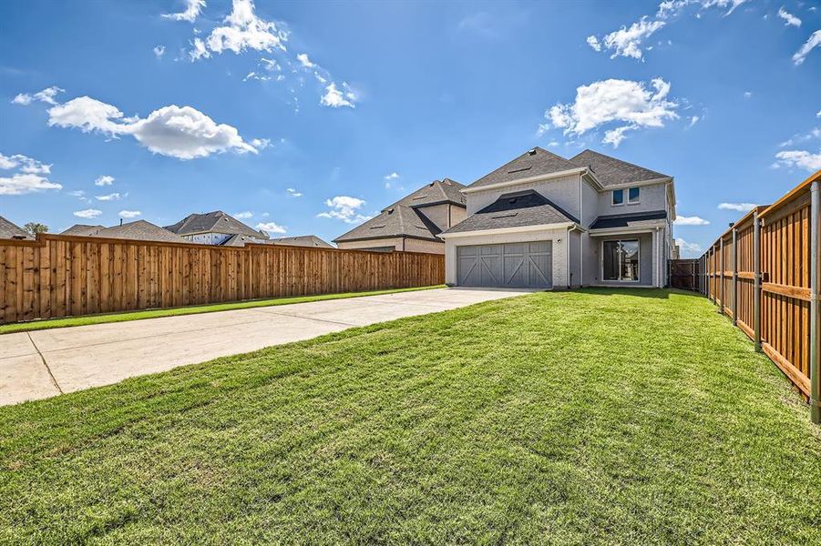 View of front of property with a front lawn