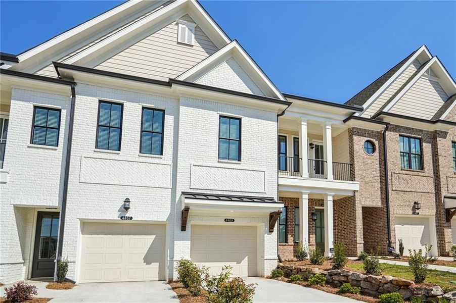 Front exterior of a new home in , Peachtree Corners, GA, highlighting curb appeal (Image 20).