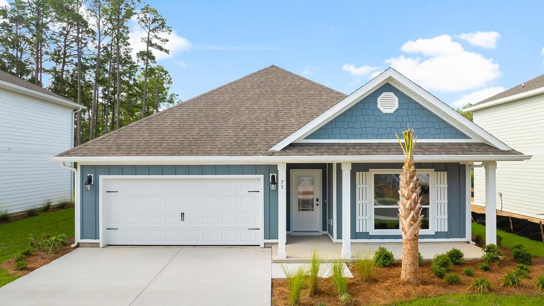 Front exterior of a new home in Nellie Preserve, Santa Rosa Beach, FL, highlighting curb appeal (Image 2). Front exterior of a new home in Nellie Preserve, Santa Rosa Beach, FL, highlighting curb appeal (Image 2).