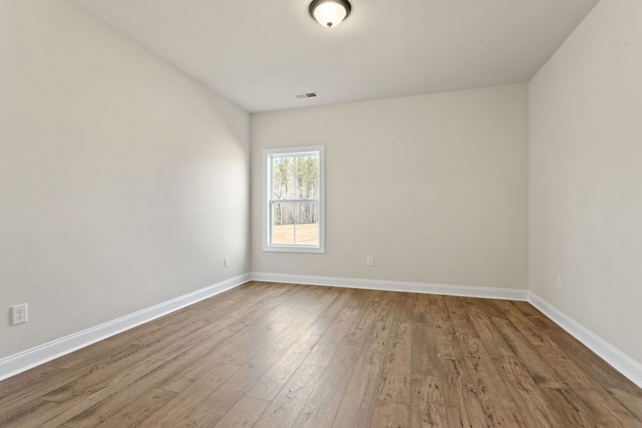 Spacious, unfurnished interior of a new home in Cherokee Knoll, Williamston (Image 18).