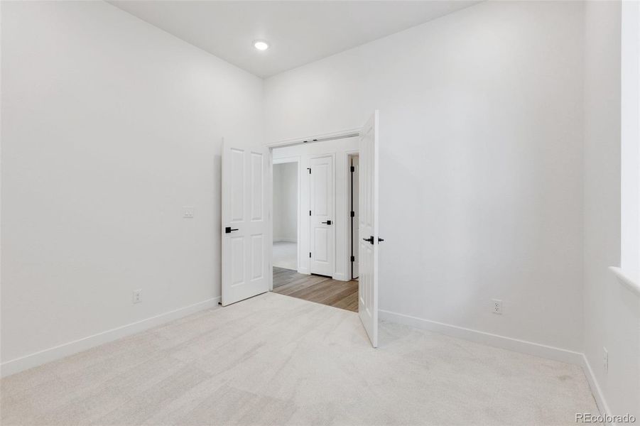 Spacious, unfurnished interior of a new home in Highlands Preserve, Mead (Image 31).