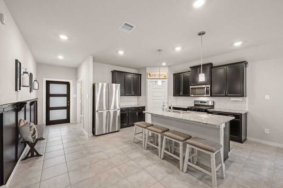 Furnished interior view inside a new home in Sierra Vista, Iowa Colony (Image 38).
