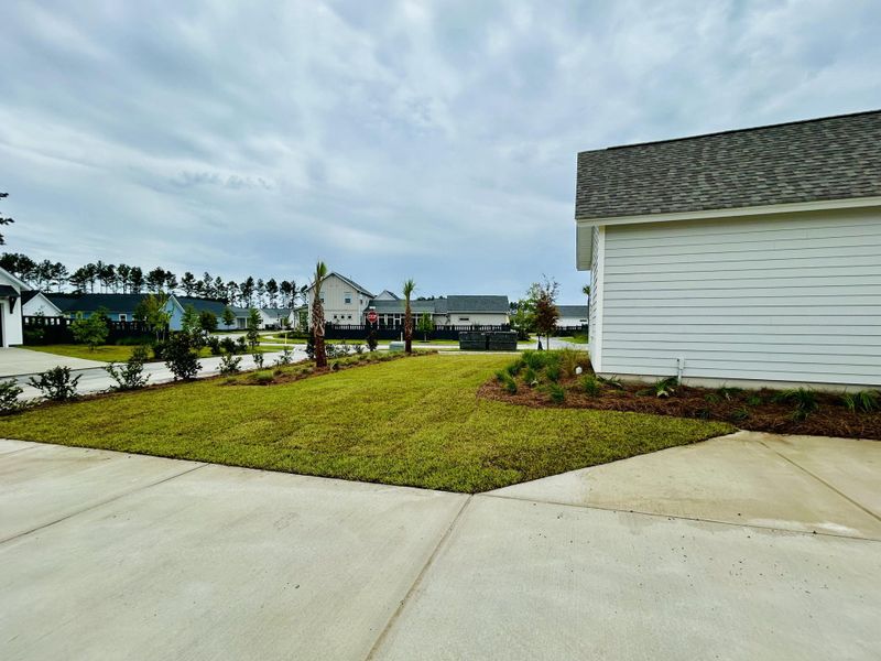 Front exterior of a new home in The Domus Collection at Midtown Nexton, Summerville, SC, highlighting curb appeal (Image 26).