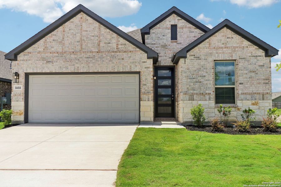 Front exterior of a new home in Kallison Ranch, San Antonio, TX, highlighting curb appeal (Image 22).
