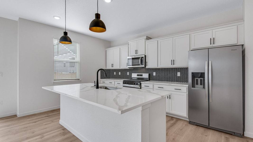 Representative furnished interior of a home built from the Bridgeport by D.R. Horton in Hansen Farm, Fort Collins (Image 5).