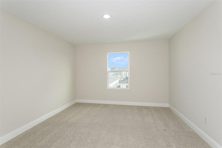 Spacious, unfurnished interior of a new home in Pasadena Woods, Dade City (Image 23).
