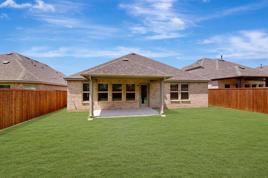 Front exterior of a new home in Kings Way, Denton, TX, highlighting curb appeal (Image 24). Front exterior of a new home in Kings Way, Denton, TX, highlighting curb appeal (Image 24).