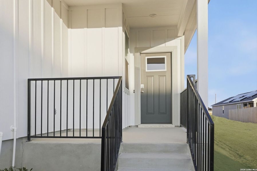 Exterior details and patio area of a home in Highland Ridge, San Antonio (Image 3).