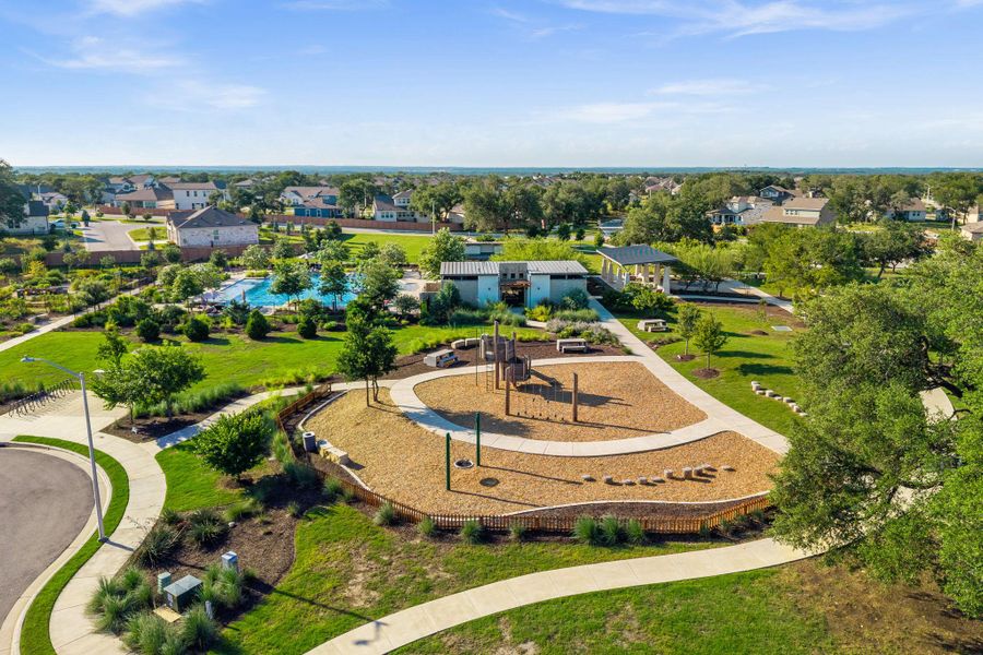 A vibrant community park with a playground, ample green space, and a sparkling pool awaits. A vibrant community park with a playground, ample green space, and a sparkling pool awaits.