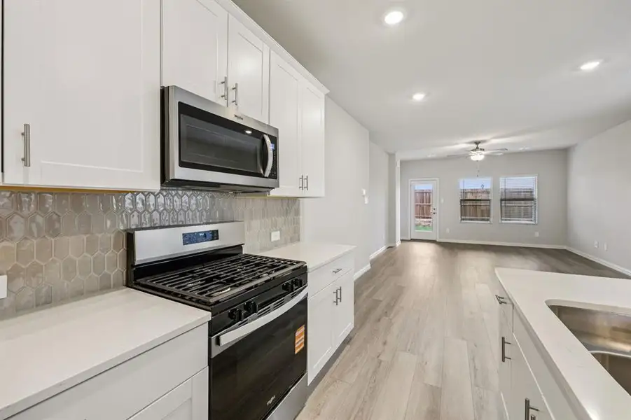 Furnished interior view inside a new home in Parks at Foster Crossing - Spring Series, Anna (Image 11).