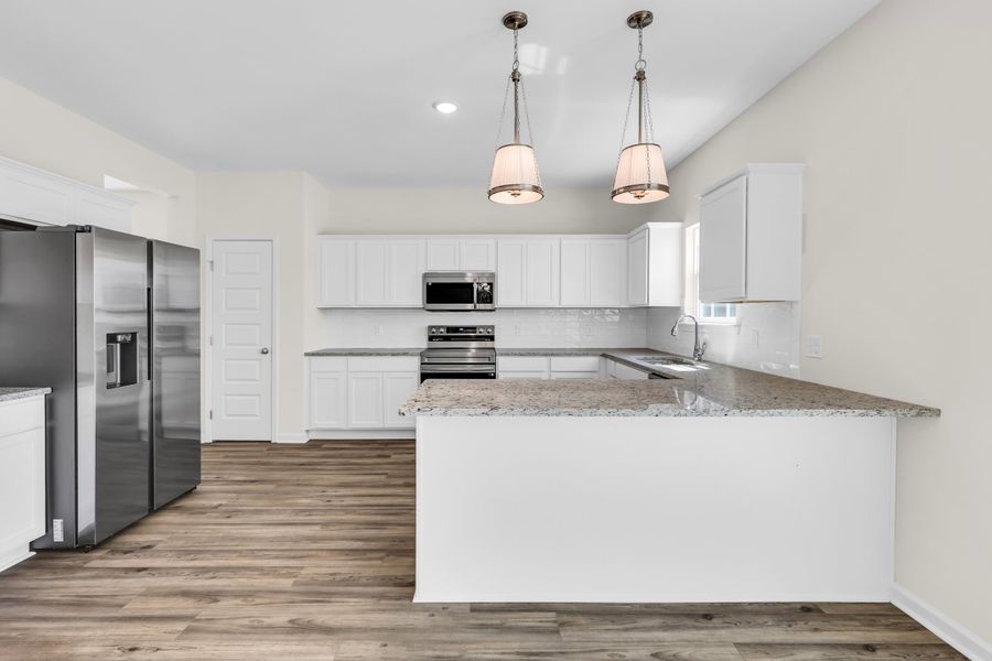 Representative furnished interior of a home built from the The Duncan by RTS Homes in The Village at Sassafras, Allenhurst (Image 11).