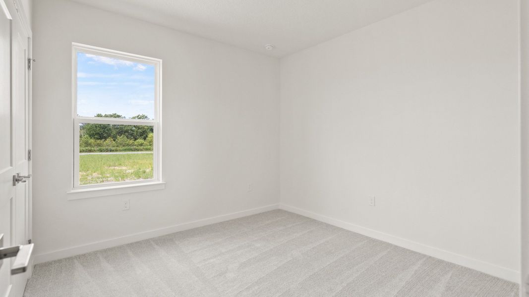 Representative furnished interior of a home built from the Flagler by DRB Homes in Grasslands West, Lakeland (Image 28).