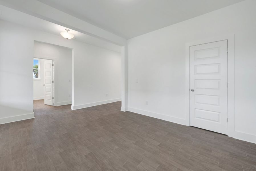 Spacious, unfurnished interior of a new home in McAlister Creek, Clayton (Image 13).