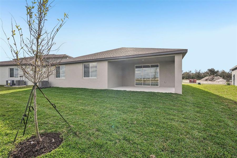 Exterior details and patio area of a home in Oakfield Trails - Signature Series, Parrish (Image 25).
