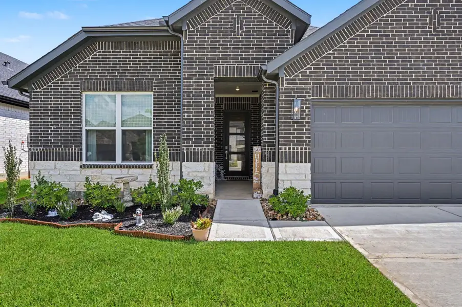 Exterior details and patio area of a home in , Conroe (Image 25). Exterior details and patio area of a home in , Conroe (Image 25).