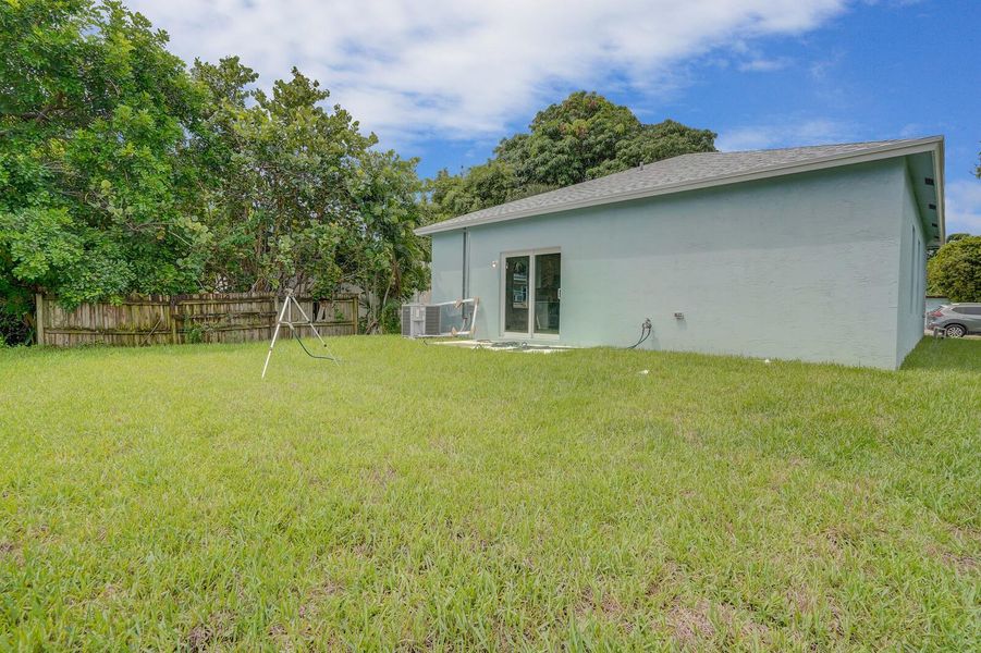 Front exterior of a new home in , Lantana, FL, highlighting curb appeal (Image 13). Front exterior of a new home in , Lantana, FL, highlighting curb appeal (Image 13).