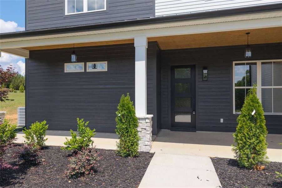 Exterior details and patio area of a home in , Carrollton (Image 3).