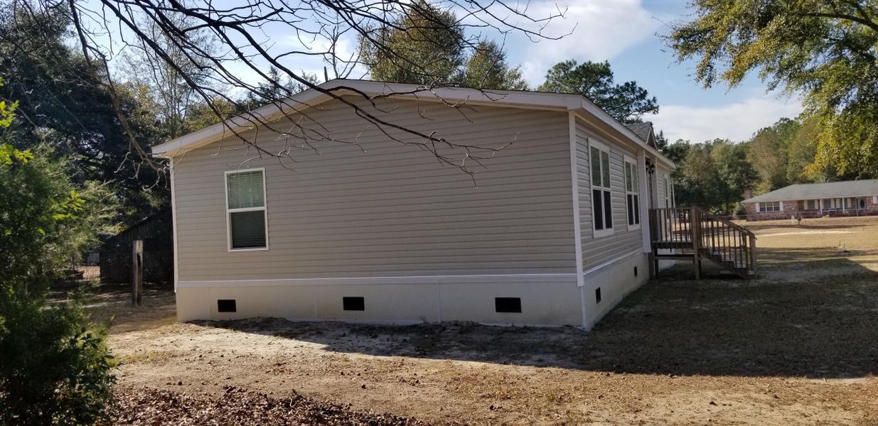 Exterior details and patio area of a home in , Varnville (Image 14).