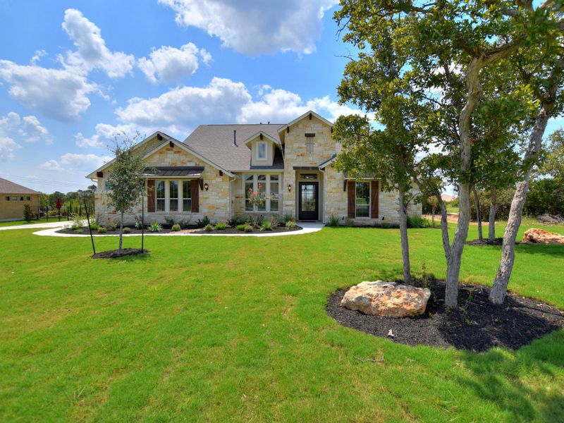 Representative exterior photo of a completed home built from the San Simeon II by Giddens Homes in Clearwater Ranch, Liberty Hill, TX (Image 28).