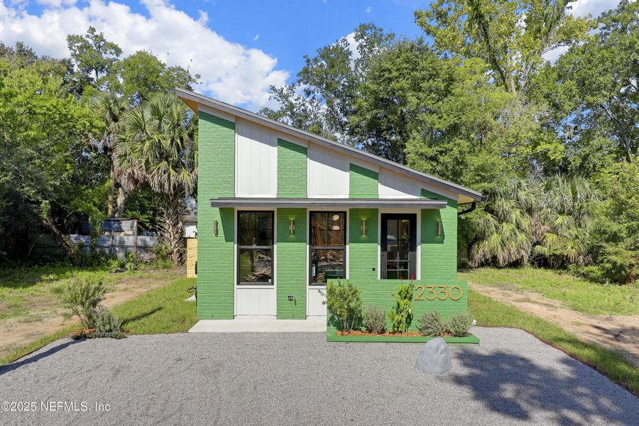 Front exterior of a new home in , Jacksonville, FL, highlighting curb appeal (Image 28).