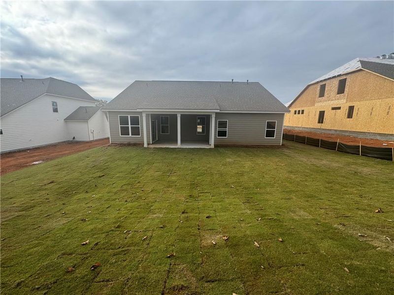 Exterior details and patio area of a home in Rosewood Lake Preserve, Hoschton (Image 3).