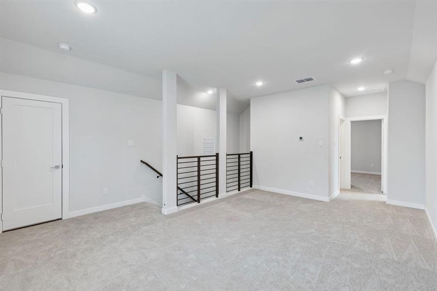 Game Room in the Stanley II home plan by Trophy Signature Homes – REPRESENTATIVE PHOTO